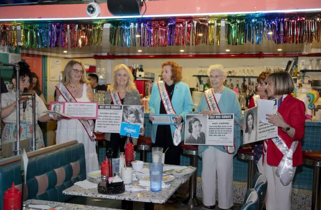 Ellen Hart pictured with fellow Miss Subways. From left to right: Eileen Ryan Keating, Dolores Mitchell Byrne, Maureen Walsh Roaldsen, Mary Gardiner, Heide Hafner, and Ellen Hart.