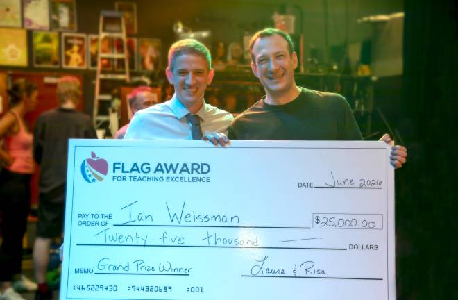 Mr. Weissman (right) poses with Michael Fram (left), principal of Repertory Company High School for Theatre Arts.