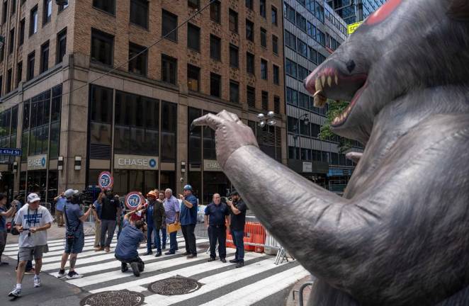 Union members bring out an inflatable rat on July 8 to protest non-union contractors working at 235 E. 42nd St. which where a building under renovation was damaged when steel beams buckled and floors sagged.