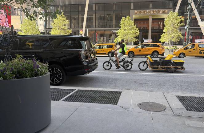 The manhole where a group emerged on Aug. 18 is pictured across from Madison Square Garden on Aug. 24.