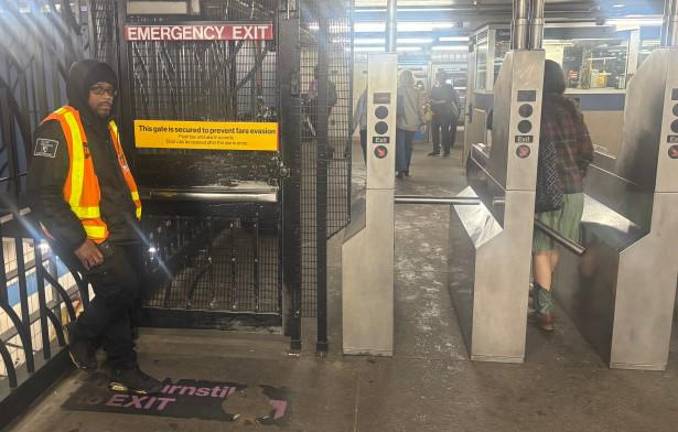 At the Grand Street stop on the B and D lines in Chinatown, we encounter one of the gates with a 15-second delay, which in this case also has a security guard to prevent someone from opening the door from the inside that would allow fare evaders to stream in. But the MTA is reluctant to release a list of stations with the delay gates as it faces some blowback from disability advocates.