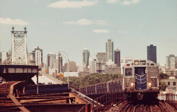 In an undated photograph, this set of R32 Brightliners have tunneled to Queens to arrive at the Ditmars Avenue Station in Astoria.