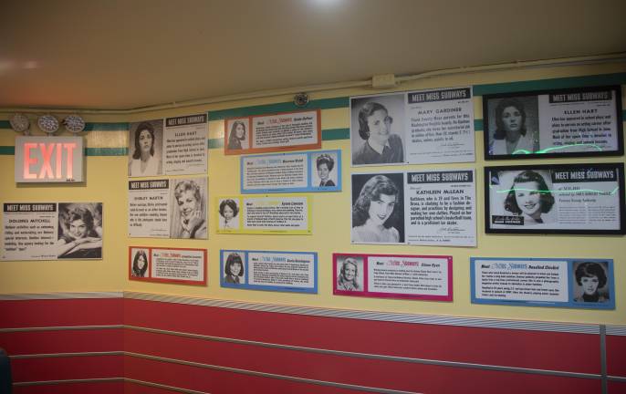 The “Miss Subways” wall in Ellen’s Stardust Diner, showing the various women’s original posters which lined subway cars from 1941 until 1976.