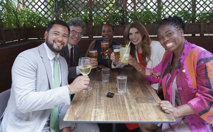 City Council Members (from clockwise) Justin Sanchez, Lincoln Restler, Kamillah Hanks, Julie Menin, and Shanel Thomas-Henry celebrate the return of year-round roadside dining.