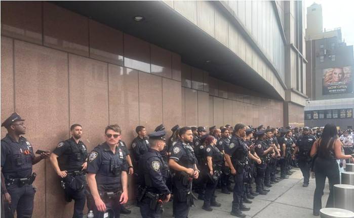 Cops, such as the those above during the Knicks championship finals, have been facing mandatory overtime during a summer of Knicks, Taylor Swift, FIFA World Cup and America’s 250 birthday. The PBA is blasting the Mamdani Administration for delaying checks for overtime pay.