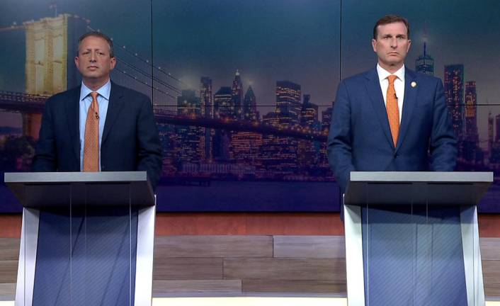 Brad Lander and Dan Goldman during a June 1 Democratic primary debate