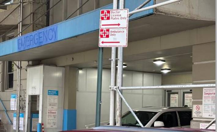 Beth Israel was shut down more than three months ago by Mount Sinai but there are still 40 parking spaces reserved for ambulances and private vehicles of doctors round the closed facility–which has no patients and no emergency room. Note the painted over “Emergency” sign overhead.