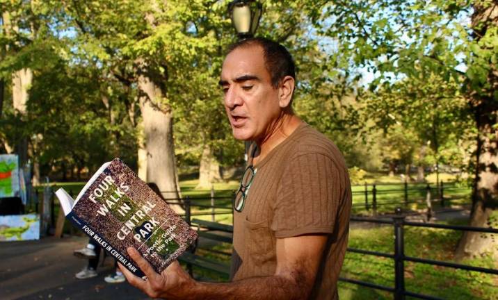 Aaron Poochigian reads from his recently published <i>“Four Walks in Central Park.”</i> He said meditative walks through Central Park helped him overcome an addiction to cocaine and eventually led to the publication of a guide book to the park that saved his life, written entirely in iambic pentameter.