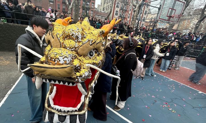Locals get ready to hoist their dragon at the Lunar New York kickoff on Feb. 17.
