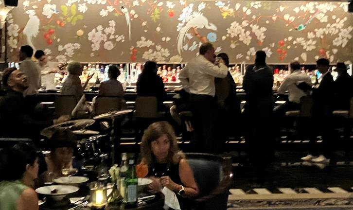 The Waldorf Astoria’s Peacock Alley bar is a buzzy meeting spot, with live music and gorgeous white-peacock-and-blossom-adorned wallpaper espousing the peacock theme behind the bar.