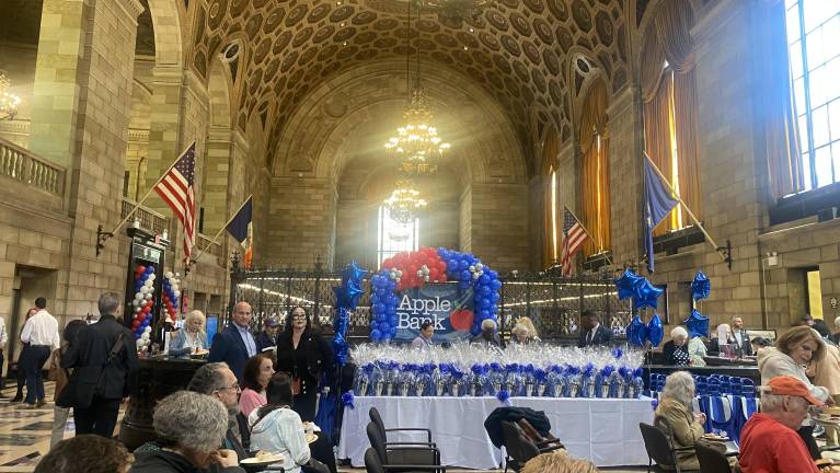 Inside the landmarked building, Apple Bank employees welcomed the residents of the Upper West Side to join in the celebration for a savings institution that traces its roots to a founding 162 years ago.