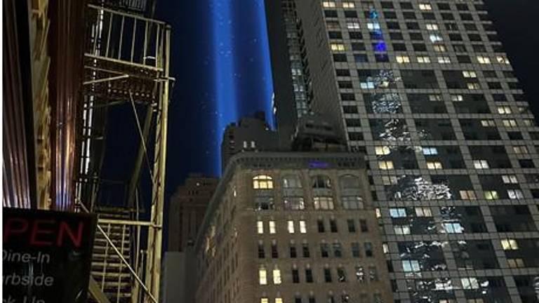 The 9-11 tower of lights as viewed from the popular downtown pub O’Hara’s a short distance from Ground Zero.