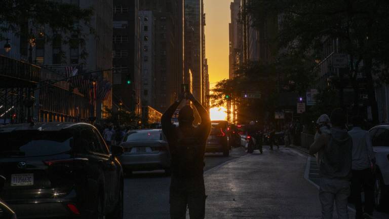 Manhattanhenge sunset visible from East 42nd Street and First Avenue.
