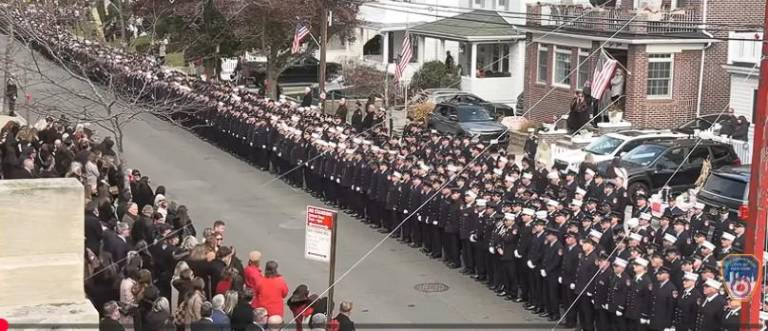 Hundreds of family, friends and firefighters lined the streets outside St. Francis de Salles R.C. Church in Belle Harbor on the Rockaway Peninsula on Nov. 15, 2025.