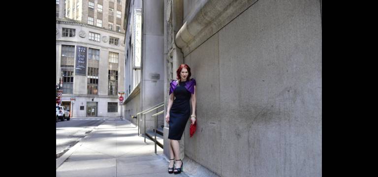 Karen Rempel waits for her cocktail date at 20 Exchange Place.
