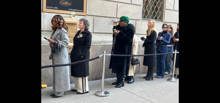 Style on display as New York Fashion Week attendees wait to enter Gotham Hall.