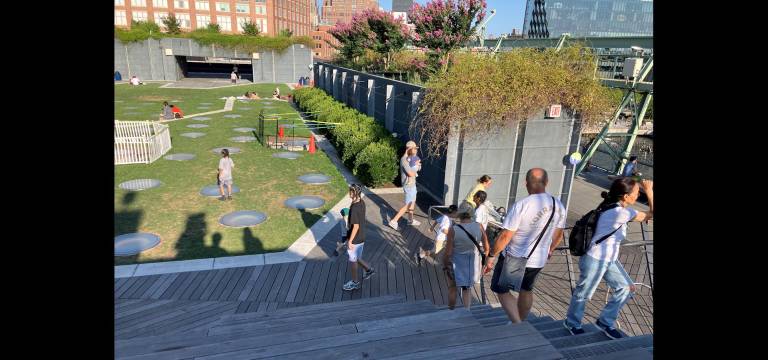 Pier 57 rooftop’s grassy lawn playground.