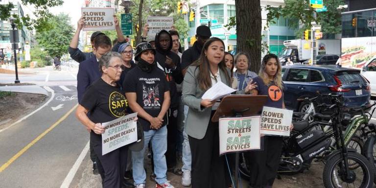 This photos shows Senator Gonzales campaigning for the passage of bill S10700 for safer streets and vehicles.