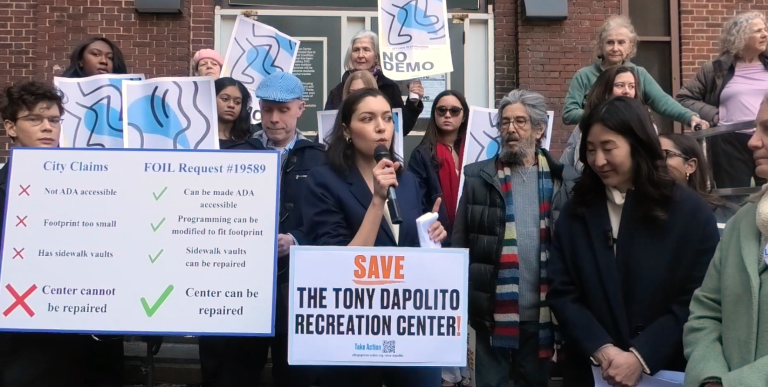 Local preservationists—such as Sommer Omar (at mic)—say that internal Parks Dept. documents prove that the Tony Dapolito Recreation Center can be repaired, rather than demolished.