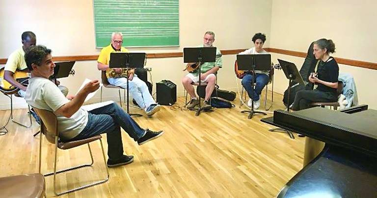 Paul Wolsk, in the yellow shirt, started playing saxophone in elementary school but gave it up shortly after college. He’s become a serious player again. He’s pictured in a jazz theory class taught by Roni Ben-Hur (left), the director of the adult division jazz program at the Lucy Moses School. Photo: Christina Cardona