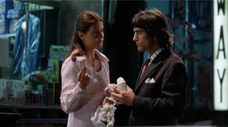 Leight Taylor Young offers De Niro a subway token to Italian-ice eating De Niro in The Gang Who Couldn’t Shoot Straight