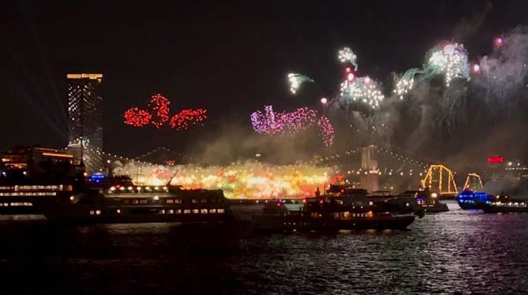 Fireworks as seen from the East River.