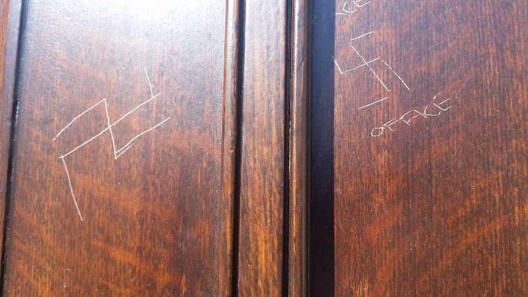 Two swastikas were carved on the front door of the Fourth Universalist Society on the Upper West Side in February 2017. Photo: Rev. Schuyler Vogel