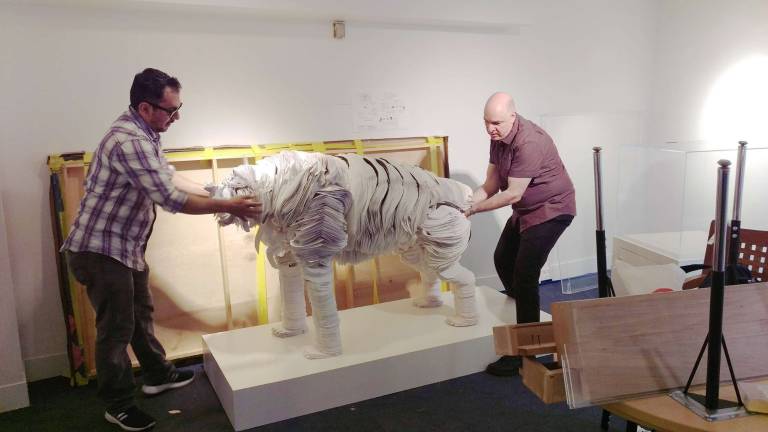 “El Tigre” by Robert Hernandez is moved into the Children’s Museum of Manhattan during installation of “Art, Artists &amp; You,” a new exhibit. Photo courtesy of CMOM