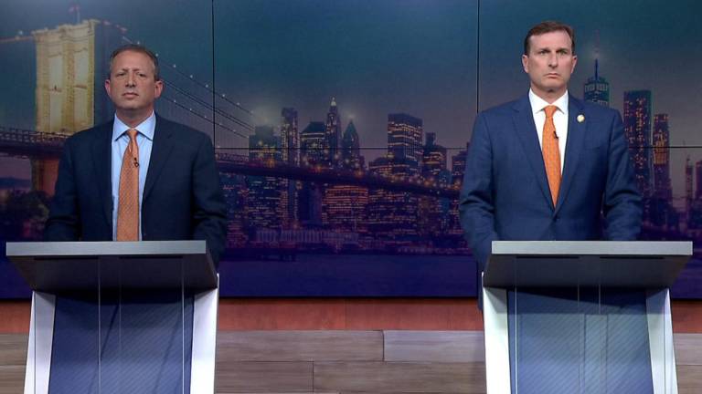 Brad Lander and Dan Goldman during a June 1 Democratic primary debate