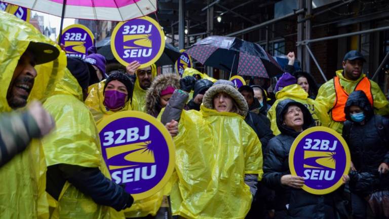 Union workers and supporters turned out for a protest across the street from Twitter’s Manhattan headquarters, where janitors lost their jobs after the tech company terminated its contract with Flagship Services. Photo: Abigail Gruskin