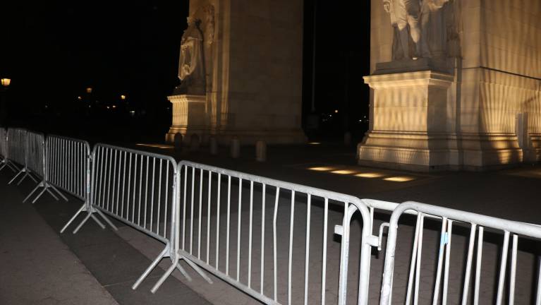 How to handle the opening around the arch is an entirely different challenge. Currently, closing the space requires the NYPD to link around a dozen of the barricades.