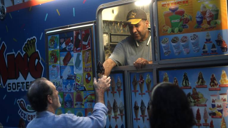 Each National Night Out event has its own festivities and treats. The 6th Precinct’s King Softee ice cream truck, dispensing free treats was a fan favorite.