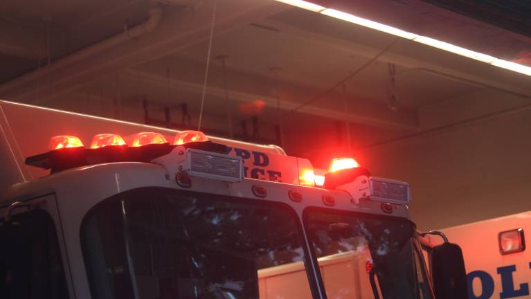 The 6th Precinct currently houses the New York Police Department Bomb Squad. Officers turned on the lights for children as they looked at the vehicles.