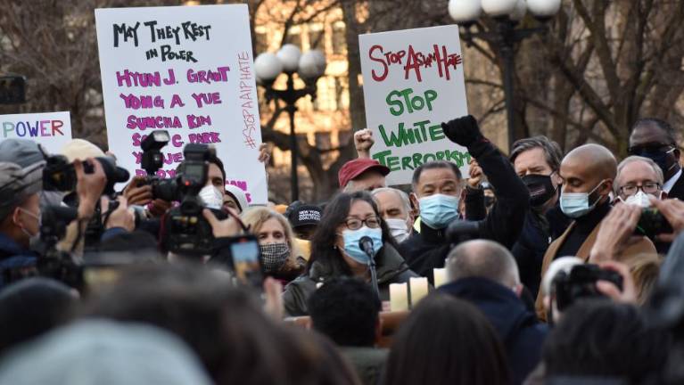 Asian American Federation Executive Director Jo-Ann Yoo speaks to the crowd that surrounds her in Union Square on March 19 about the ongoing violence against Asian Ameicans. Photo: Leah Foreman