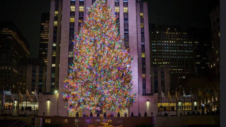 <b>The Rockefeller Center Christmas Tree which contains about five miles of light, was turned on around 10 p.m. on Nov. 29. The tree lights will be turned on every morning and 5 am until midnight and the tree is self will stay up until Jan. 14. </b>Photo: NYCmayorsoffice