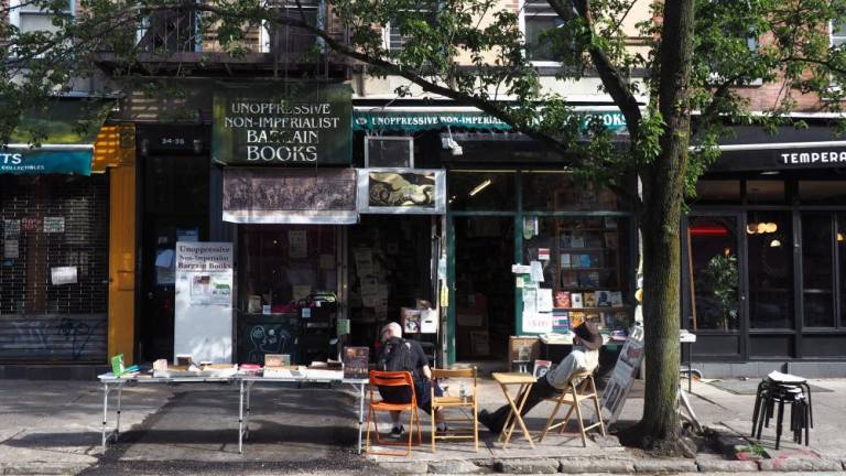 Outside of Unoppressive Non-Imperialist Bargain Books on Carmine Street. Photo: Maya Olson