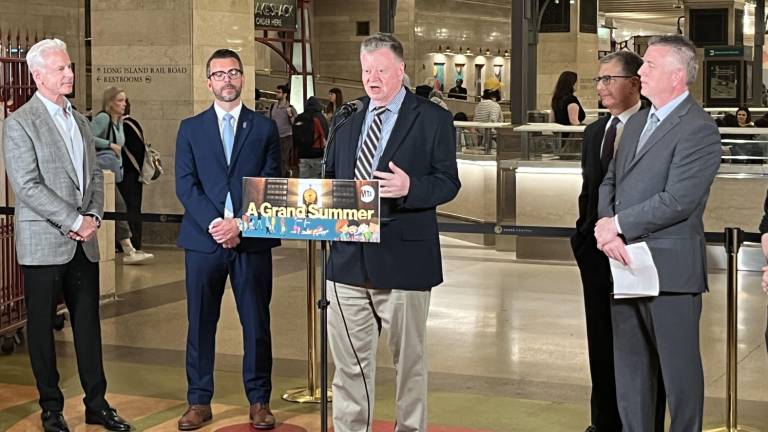 Bruce Caulfield, Principal Owner of Tracks Raw Bar and Grill at Grand Central Madison address media representatives at a press conference about the summer activities at Grand Central. Already 8 months behind schedule, the delayed opening of the first GCM retail space should be next month.