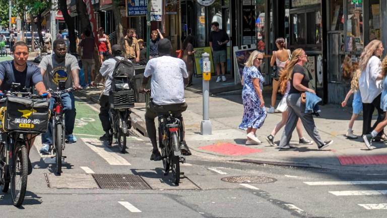 E-bikers freqently disregard traffic signs. One resident of Chinatown, Priscilla Loke was killed when she was hit by an e-biker, inspiring efforts to make all e-bikes subject to registration.