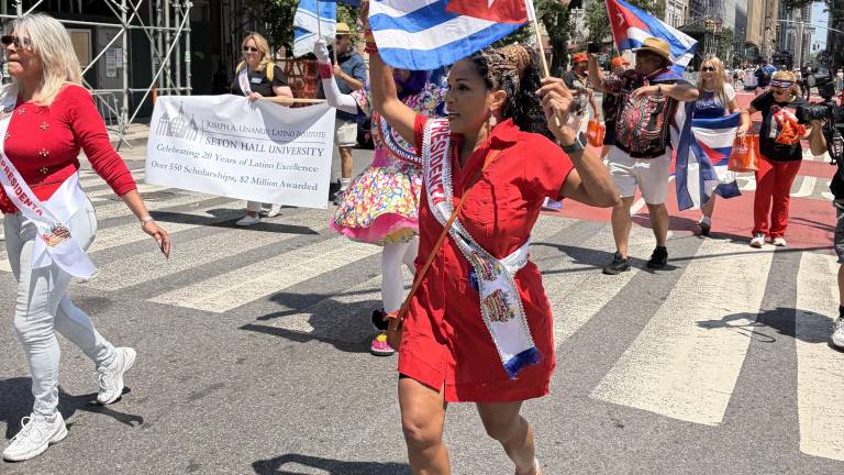 Cuban Day Parade brings multitudes including “Presidenta” Barbara Cabon (right).