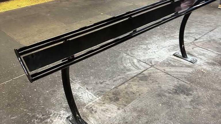 A new-style bench was installed at the West 4th Street. subway station to discourage homeless people from sleeping on benches. But the new benches also launched an avalanche of complaints on the Next Door neighborhood website, although a few posters saw their value.