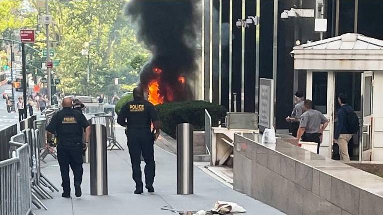 Black smoke and flames erupted in front of 26 Federal Plaza in lower Manhattan on the morning of July 20 after Army veteran Andrew Arrabaca set fire to a staircase.
