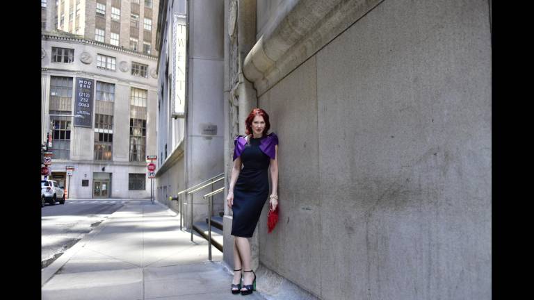 Karen Rempel waits for her cocktail date at 20 Exchange Place.